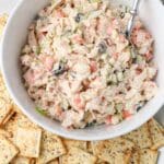 crab salad in a bowl with crackers