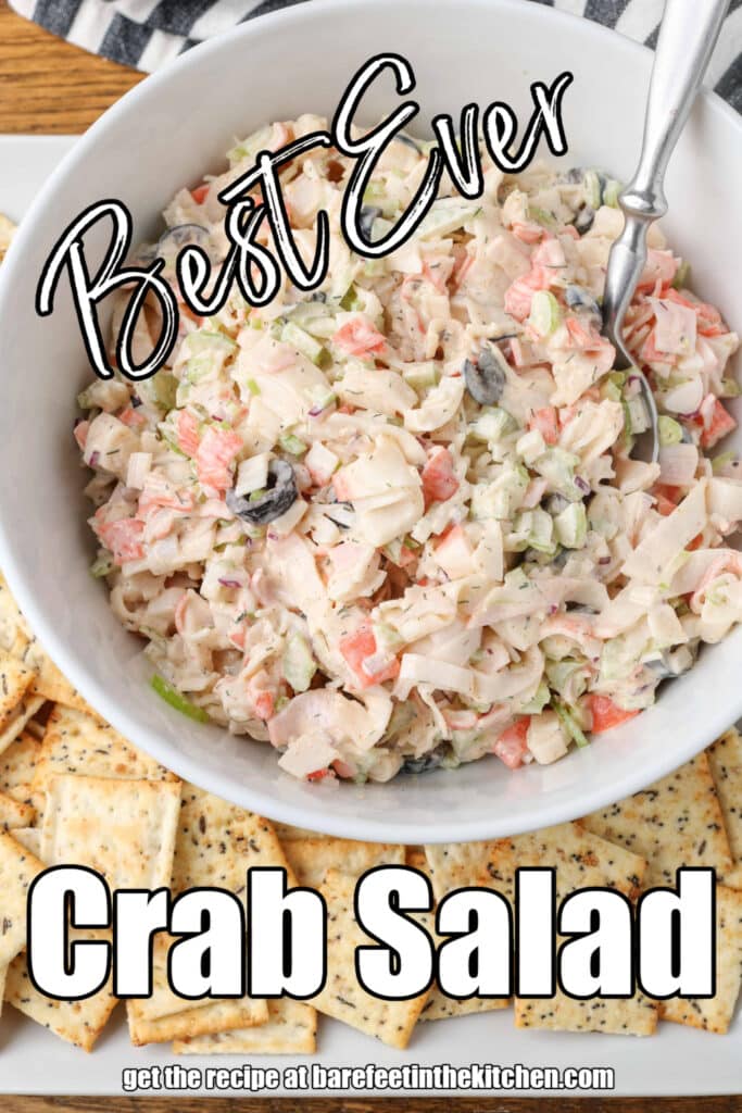 crab salad in a bowl with crackers and text overlaying the photo describing it.