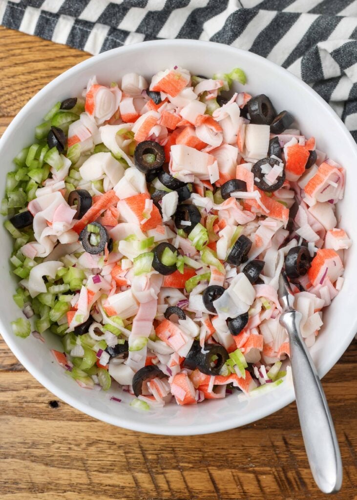 ingredients for crab salad in a bowl