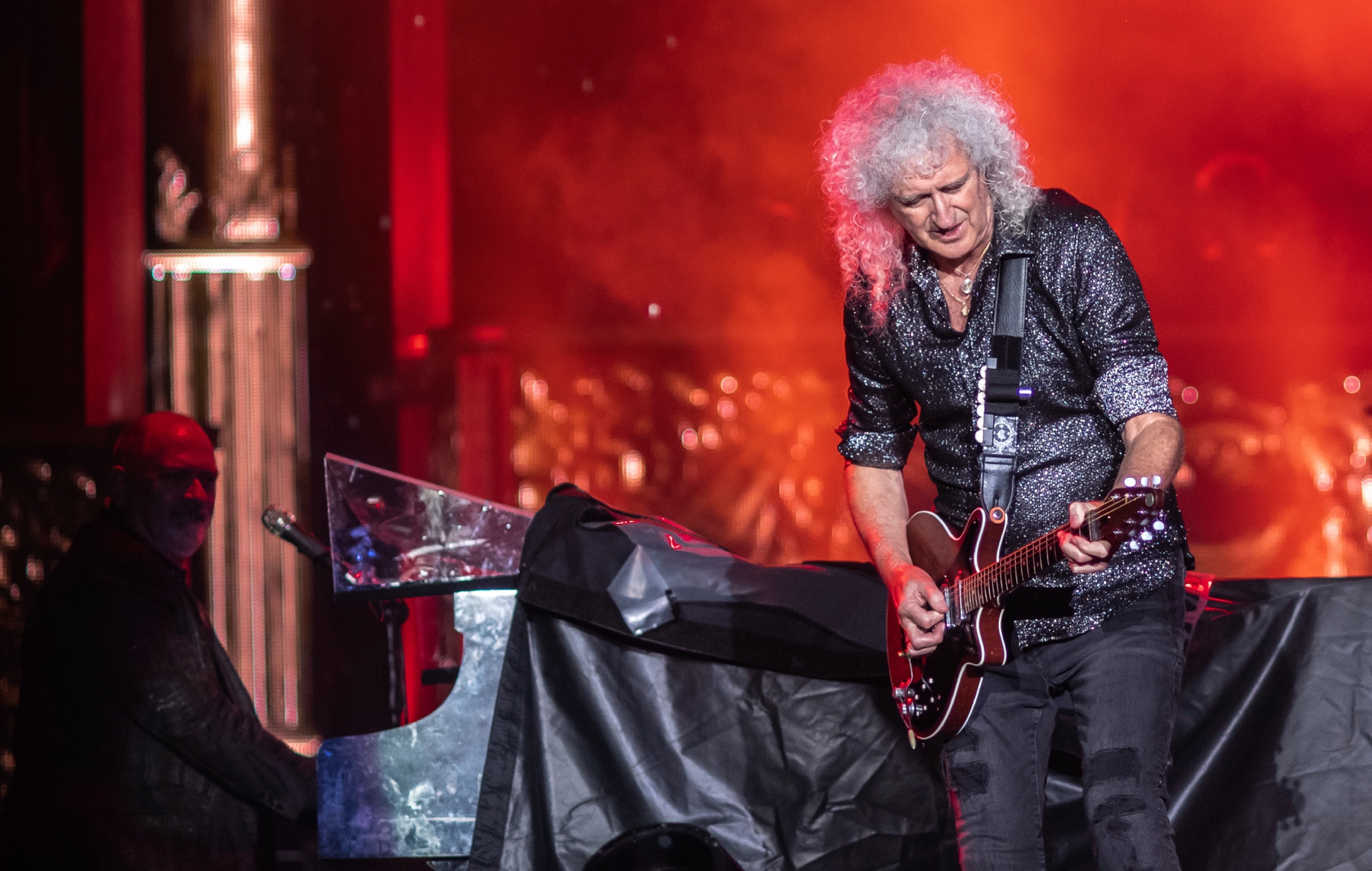 Queen's Brian May performing live on stage, photo by Marc Grimwade/WireImage/Getty