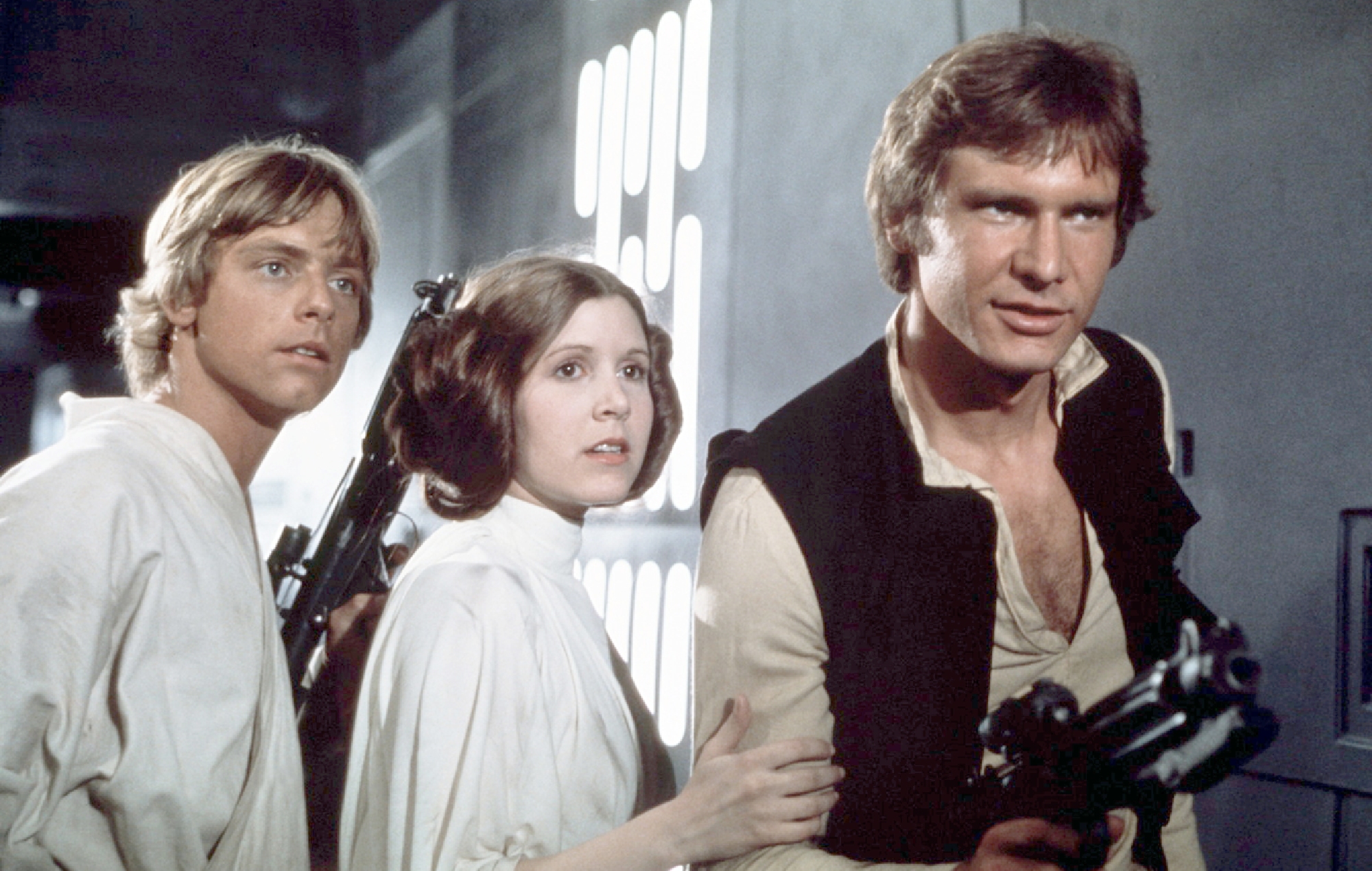 Mark Hamill, Carrie Fisher and Harrison Ford on the set of 'Star Wars'
