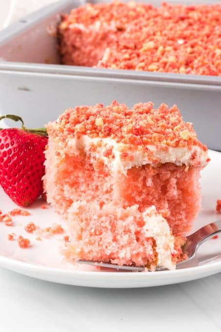 A bite of cake on a fork.