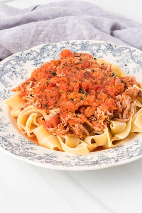 A tomato ragu with pork over Pappardelle noodles.