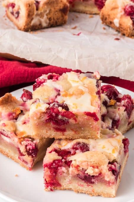 Pie Bars with cranberries and topped with an orange glaze.
