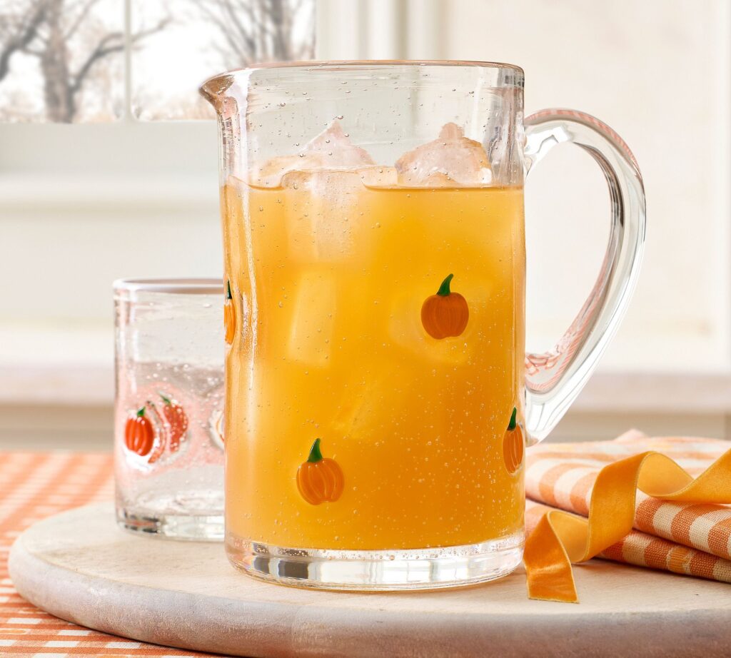 Pumpkin icon pitcher filled with orange drink