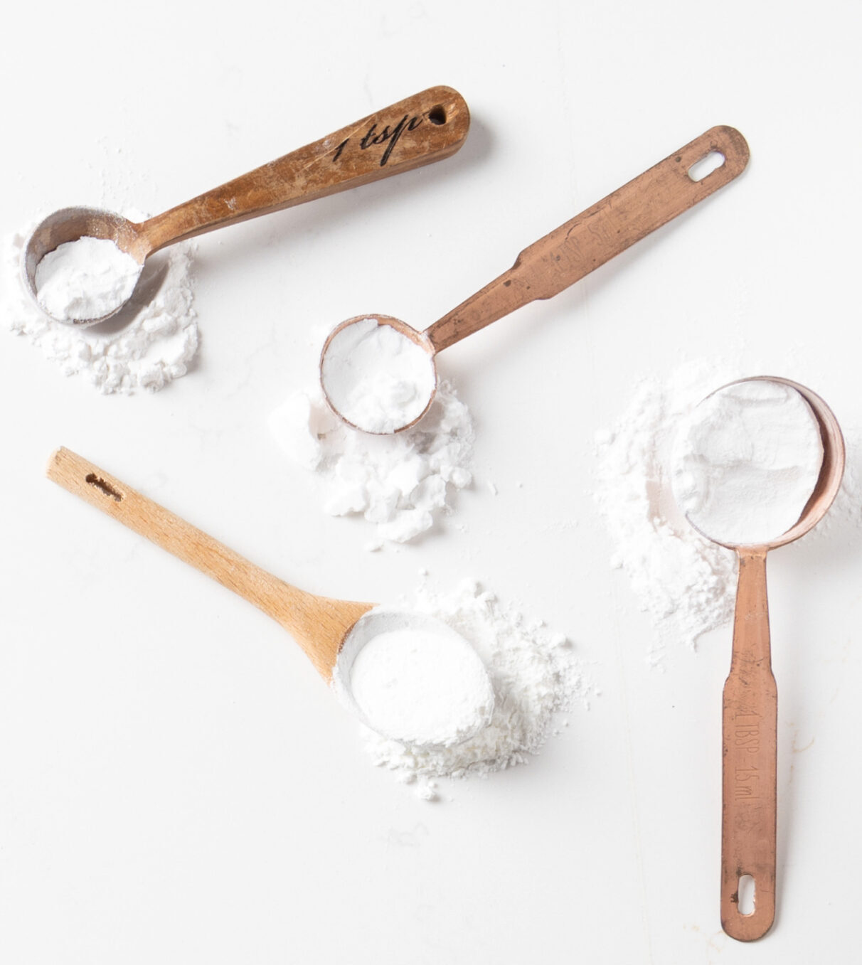 Starches on wooden measuring spoons