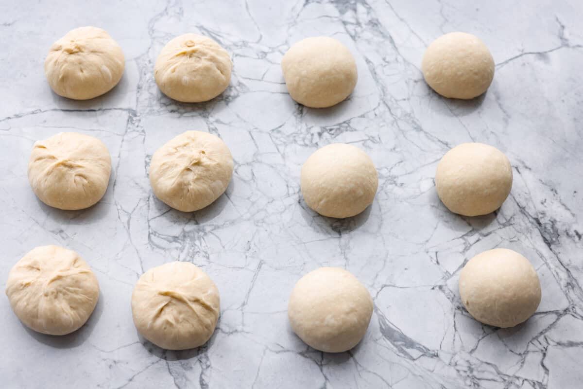 Dough sections rolled into balls. 