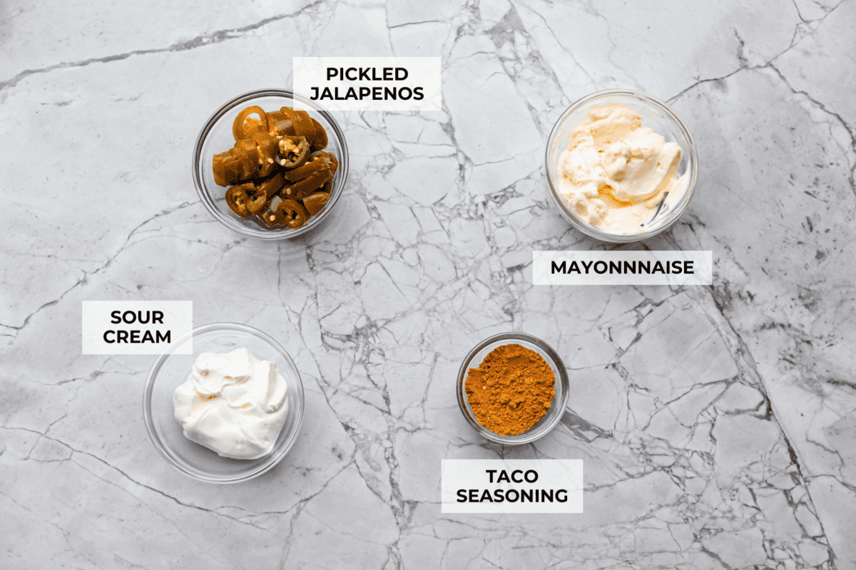 Overhead shot of labeled Taco Bell quesadilla sauce ingredients. 