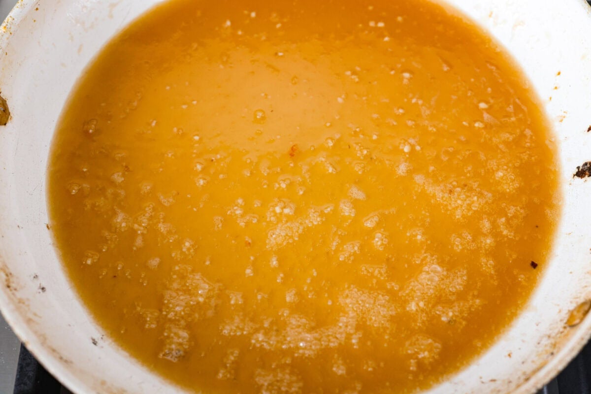 Sauce ingredients simmering in the skillet. 