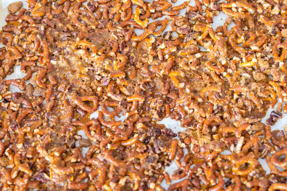 Crack pretzel mixture cooked and hardened on a cookie sheet. 