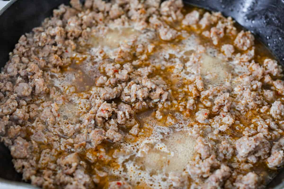 Garlic and chicken broth added to the sausage. 