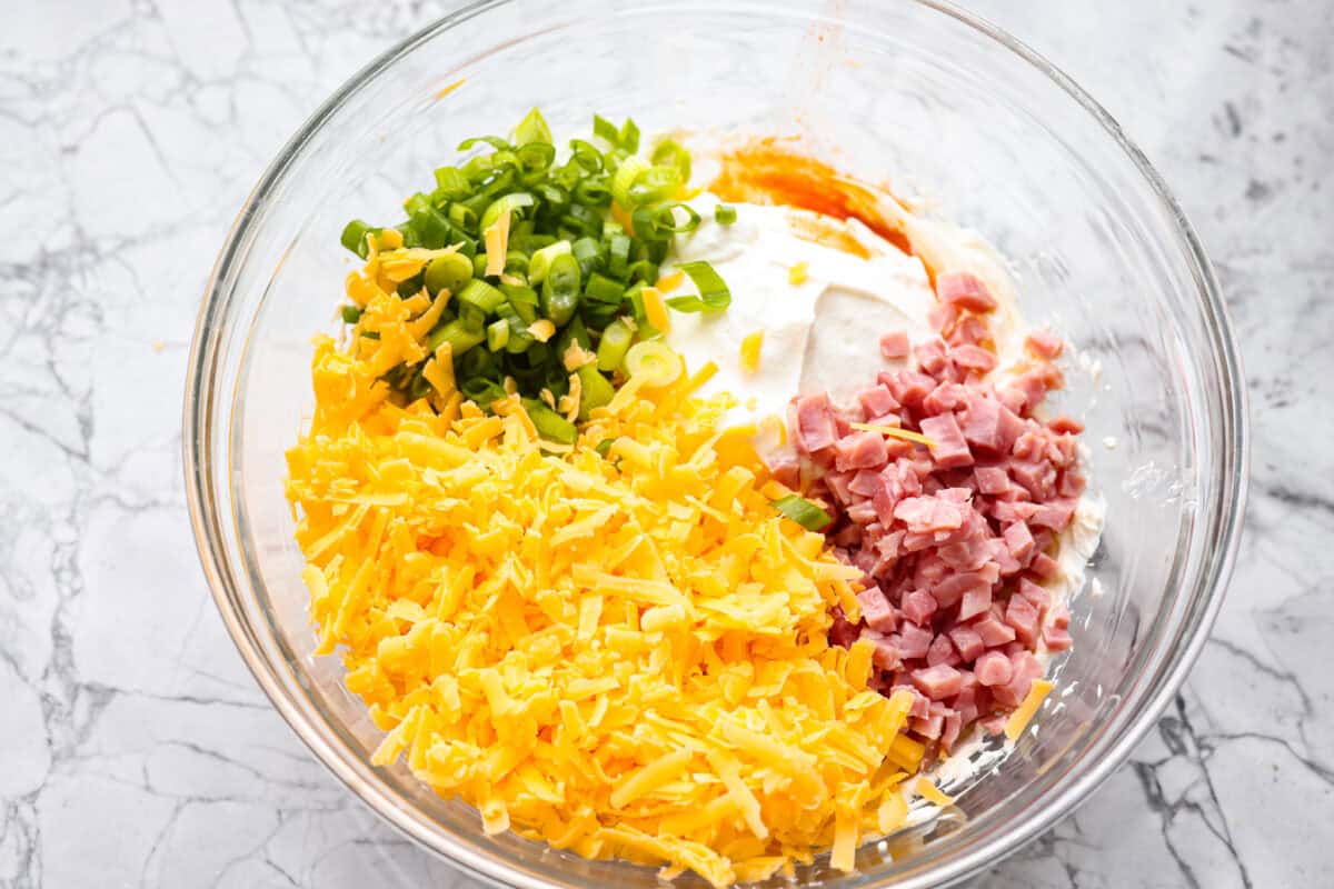 Dip ingredients all added to the softened and whipped cream cheese. 