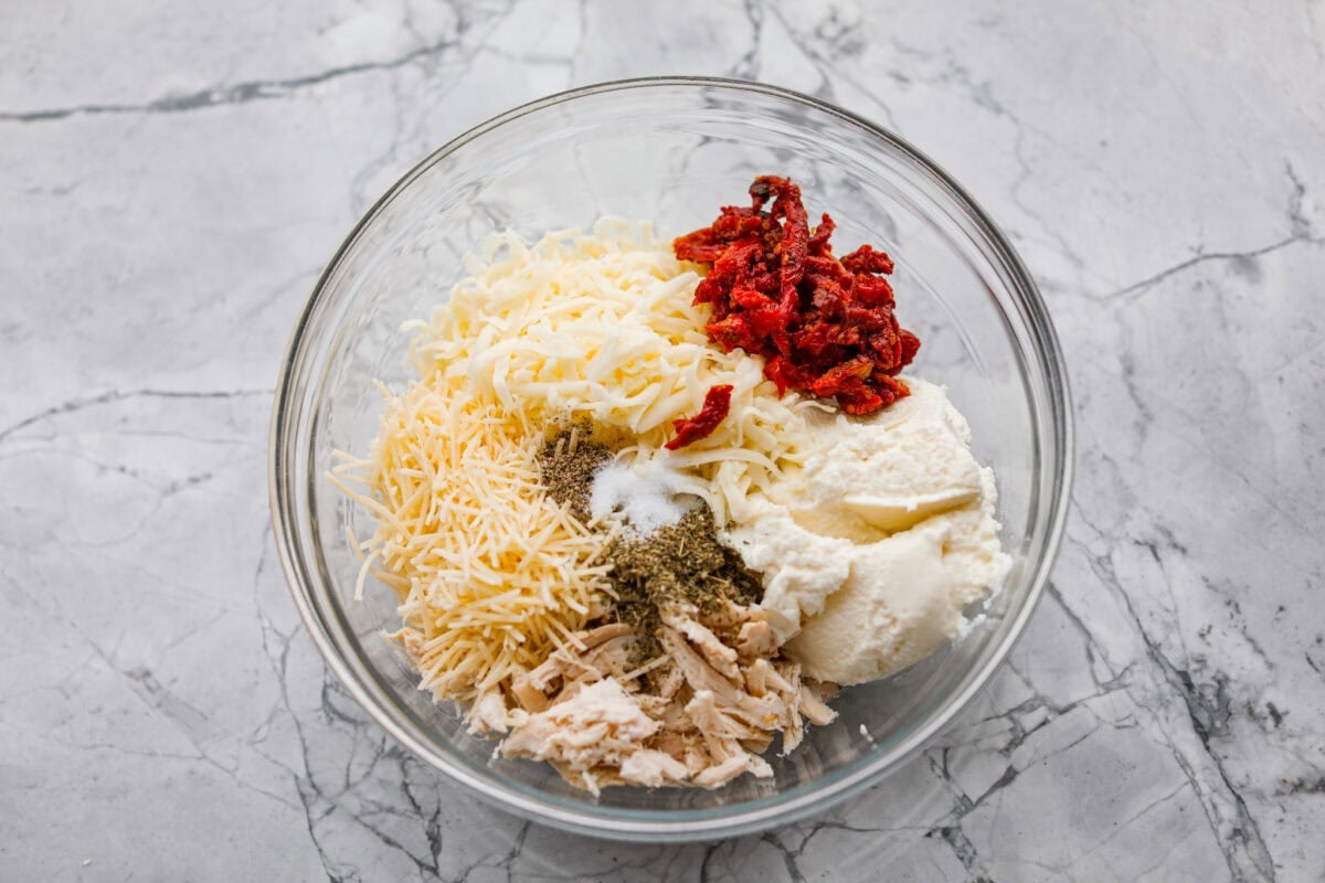 Filling ingredients added to a bowl.