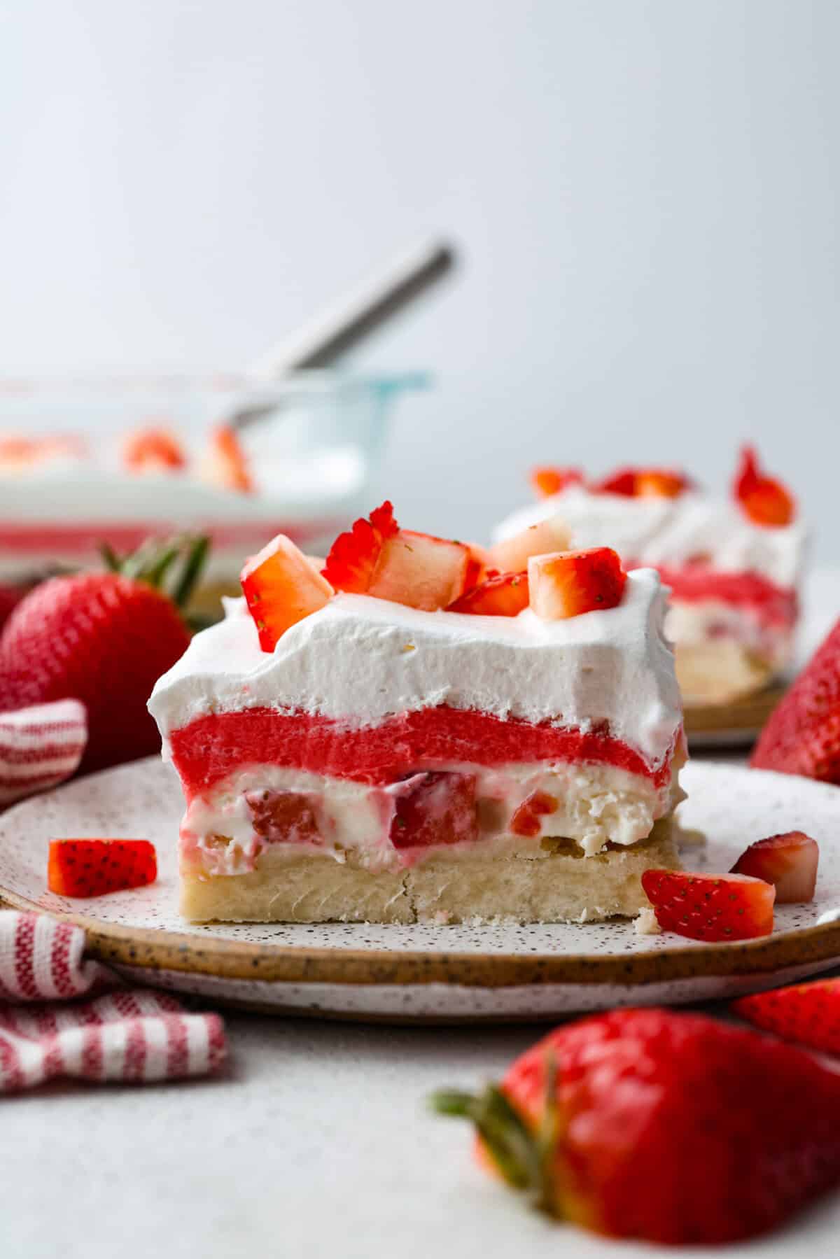 Side shot of strawberry delight on a plate. 