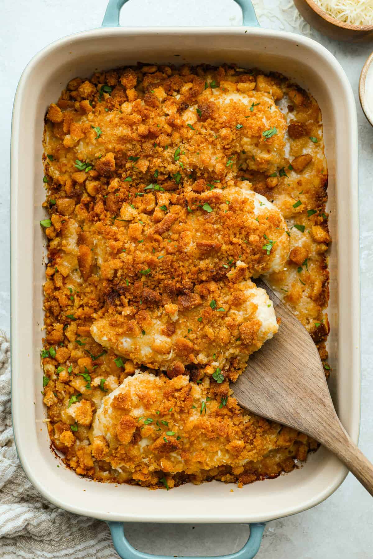 Overhead shot of baked to perfection Caesar Chicken Bake in a baking dish. 