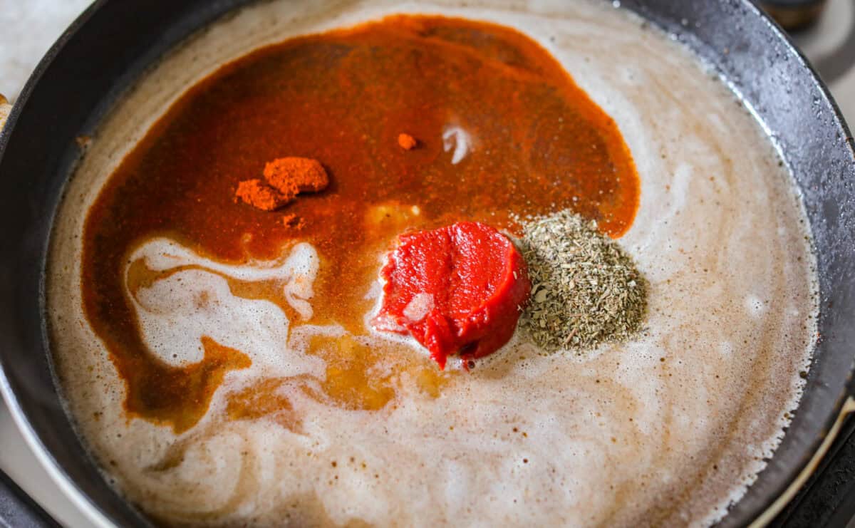 Tomato paste, Italian seasoning, and paprika added to the beef broth. 