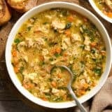 Overhead view of a chicken brothy rice bowl.
