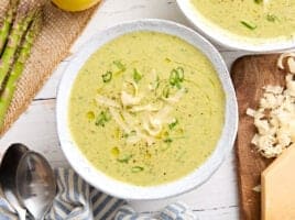 Overhead view of homemade asparagus soup in a bowl.