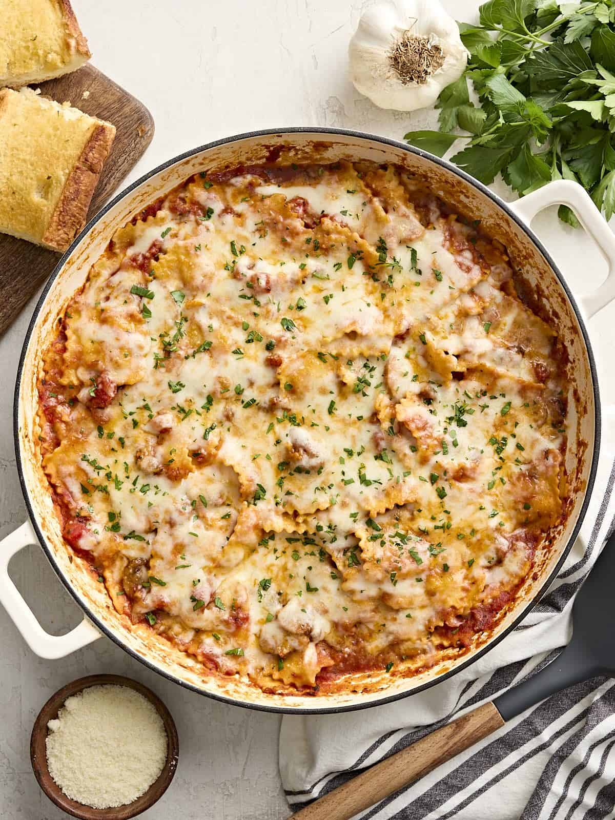 Overhead view of cheesy skillet ravioli.