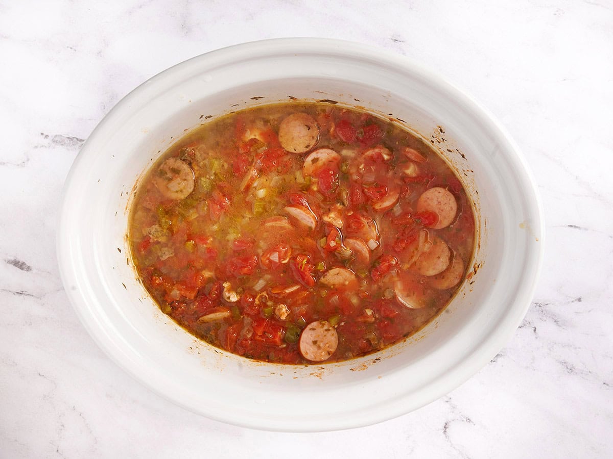 Slow cooker jambalaya simmering in the crockpot. 