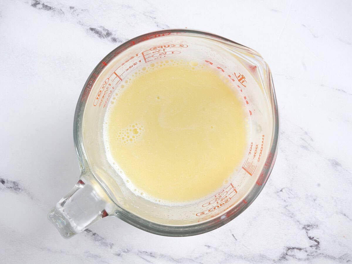 Melting butter and warming the milk in a glass measuring cup.