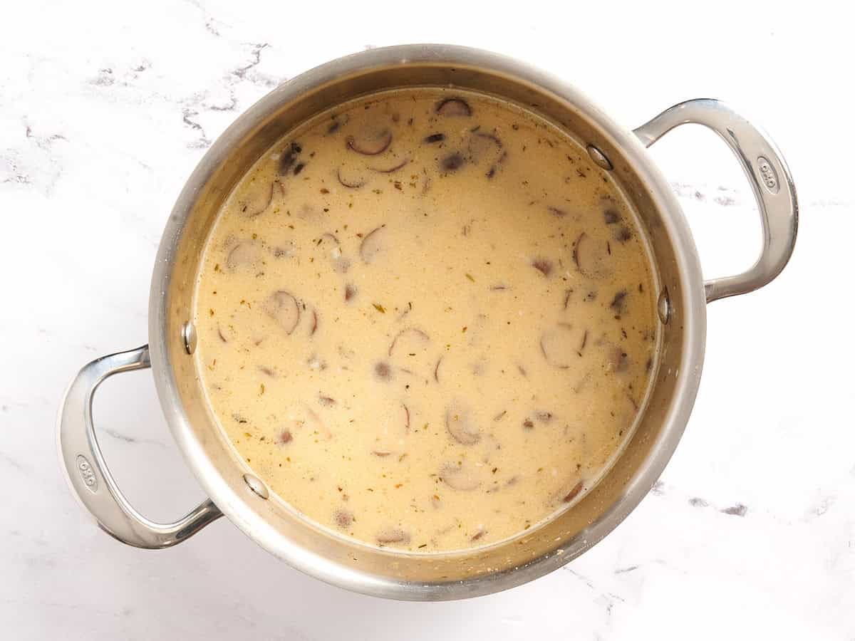 Creamy mushroom soup in a pot.