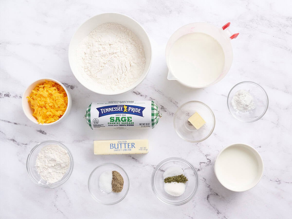 The ingredients to make Finished biscuits and gravy bake in a skillet.