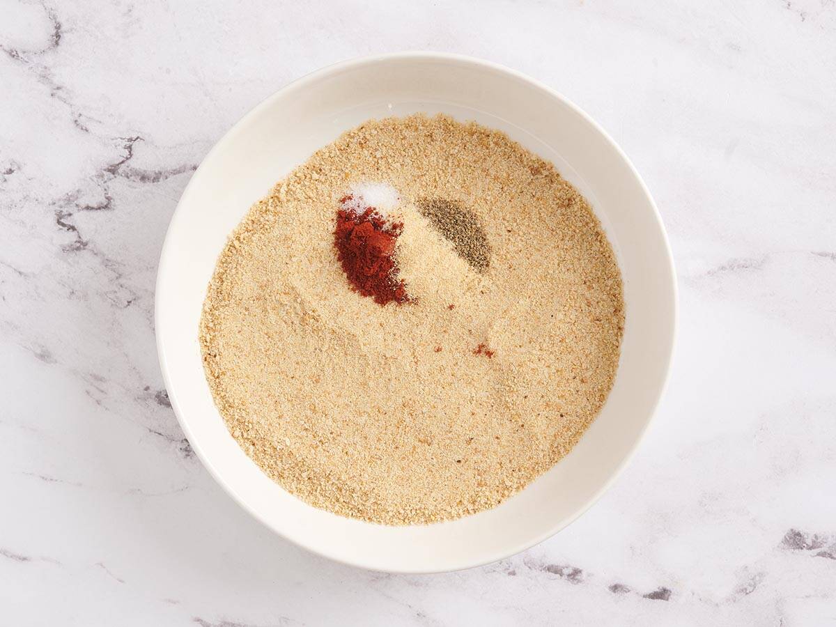 Seasonings and breadcrumbs in a bowl.