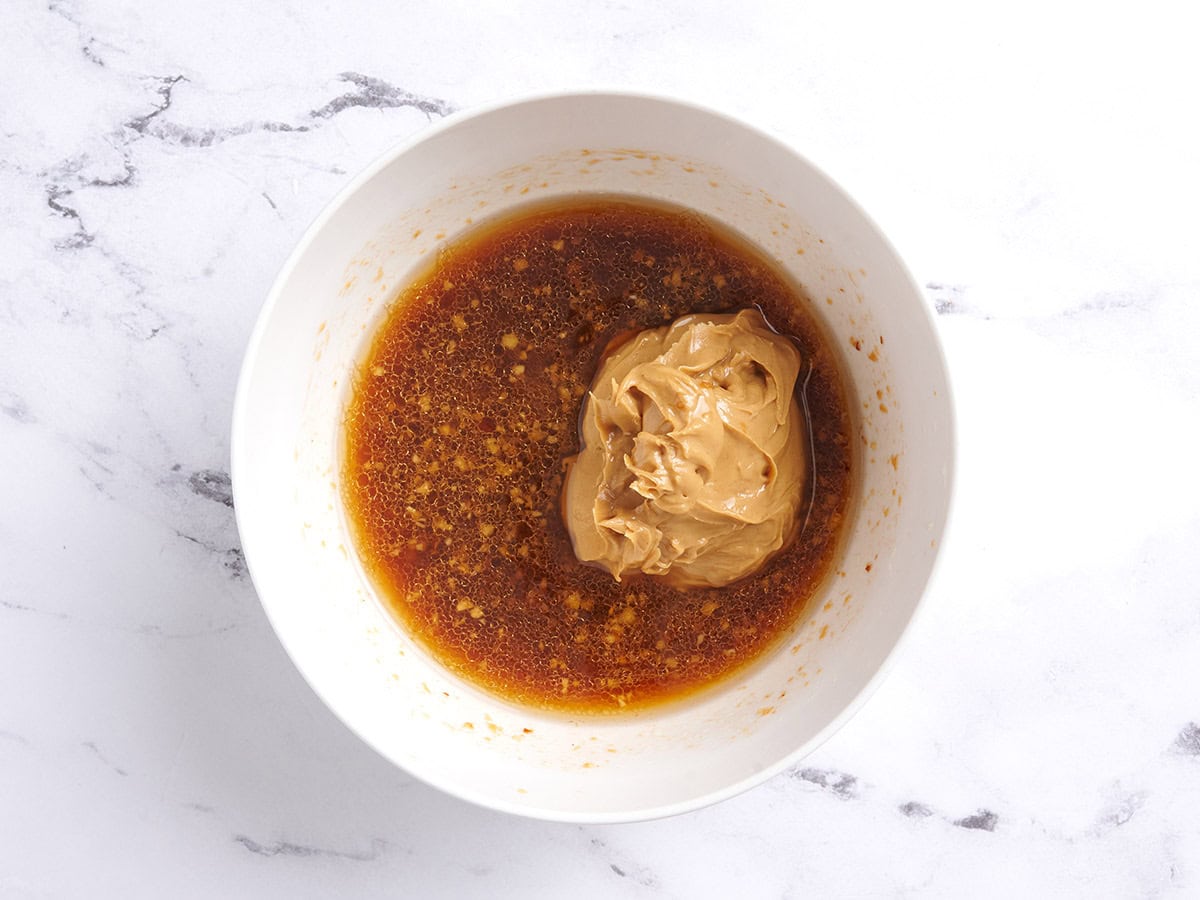 Peanut chicken marinade in a bowl.