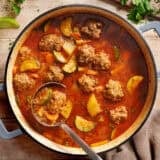 Overhead view of a pot of Mexican meatball soup (Albondigas)