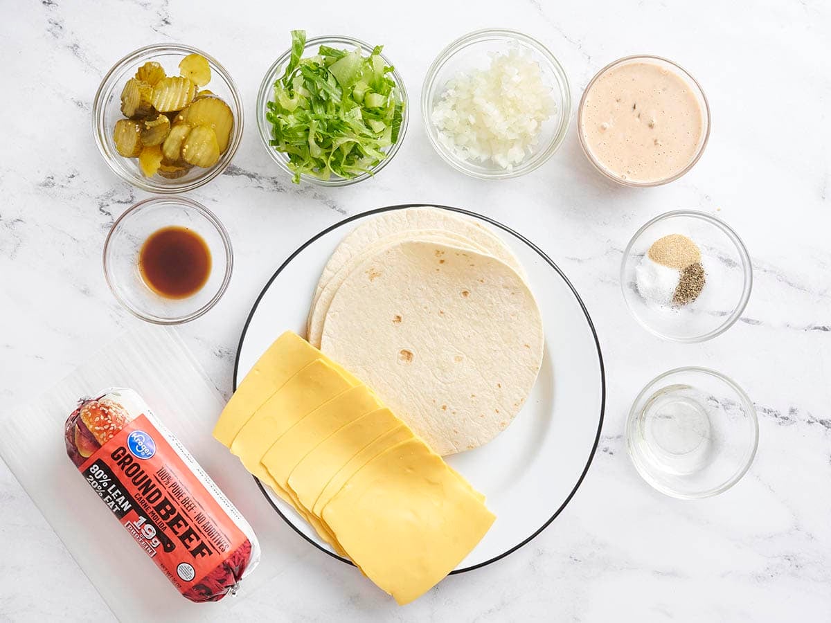 The ingredients to make homemade smash burger tacos.