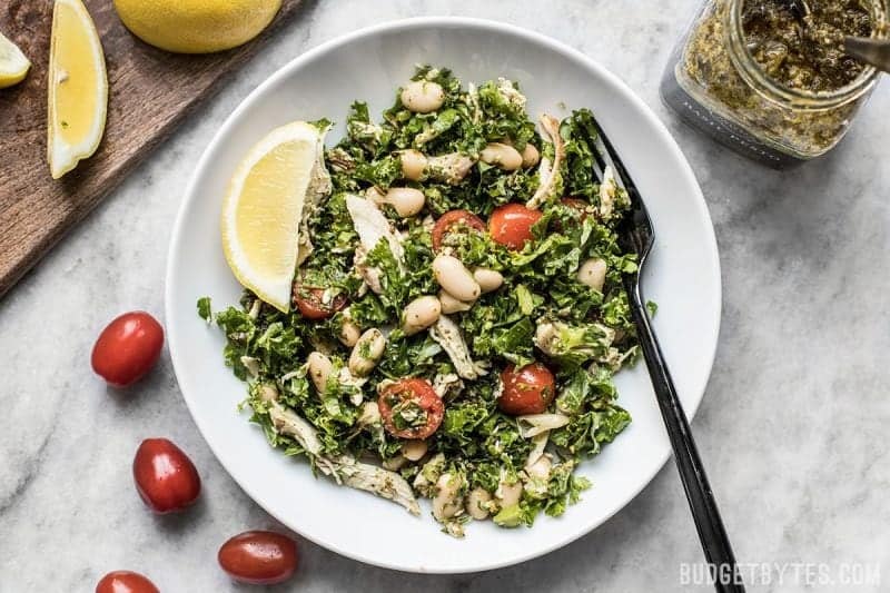 This Make Ahead Kale White Bean and Pesto Salad keeps your fridge stocked with good for you food that you can customize each day for a new meal. Budgetbytes.com