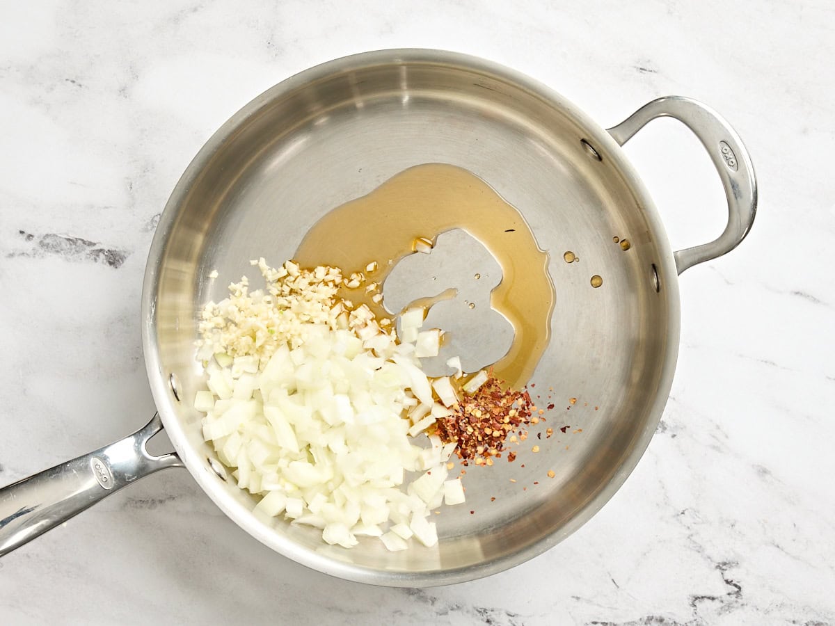Diced onion and oil in a skillet.