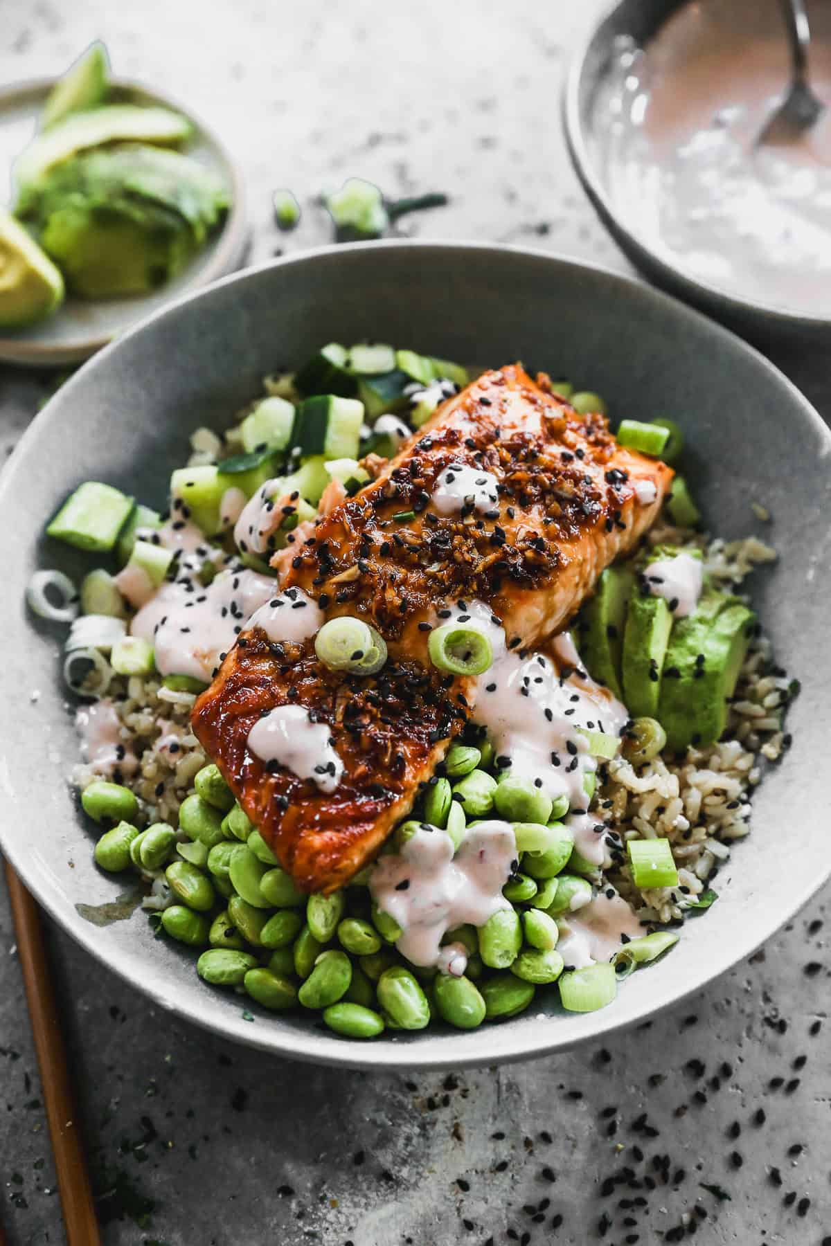 teriyaki salmon bowls with creamy sauce and edamame