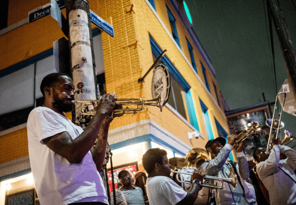 Frenchmen Street is overflowing with amazing musicians, those who have regular standing gigs at the bars up and down the street and even the younger generation musicians who come out to busk during the busy hours of Frenchmen Street. These musicians don't even let a little rain stop them from performing.